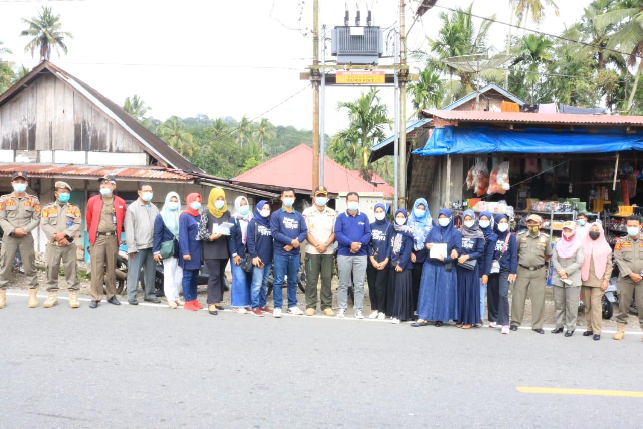 Pembagian Masker dalam Rangka Promosi Kesehatan dan Penanggulangan COVID-19